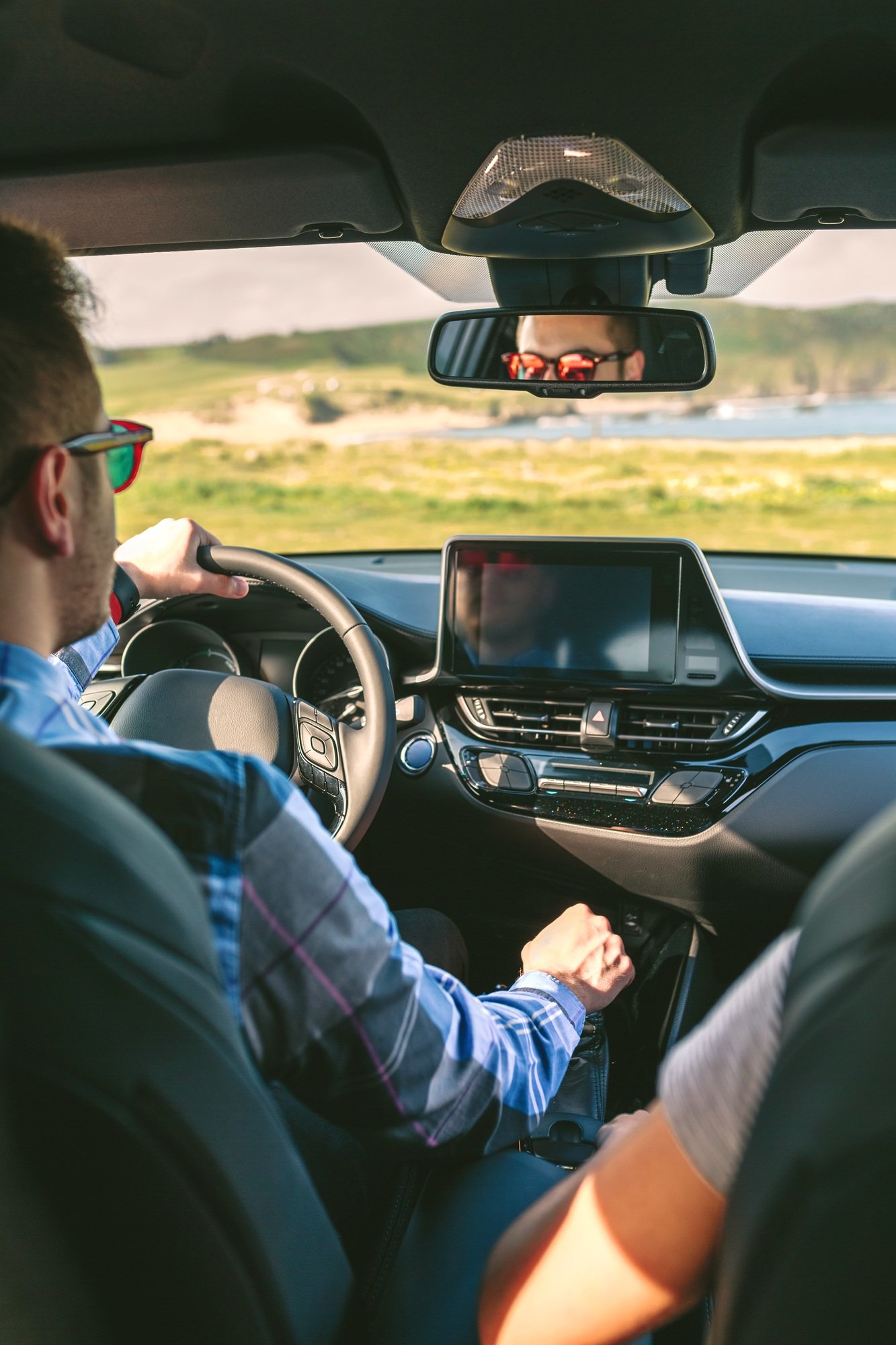 Young man driving a car